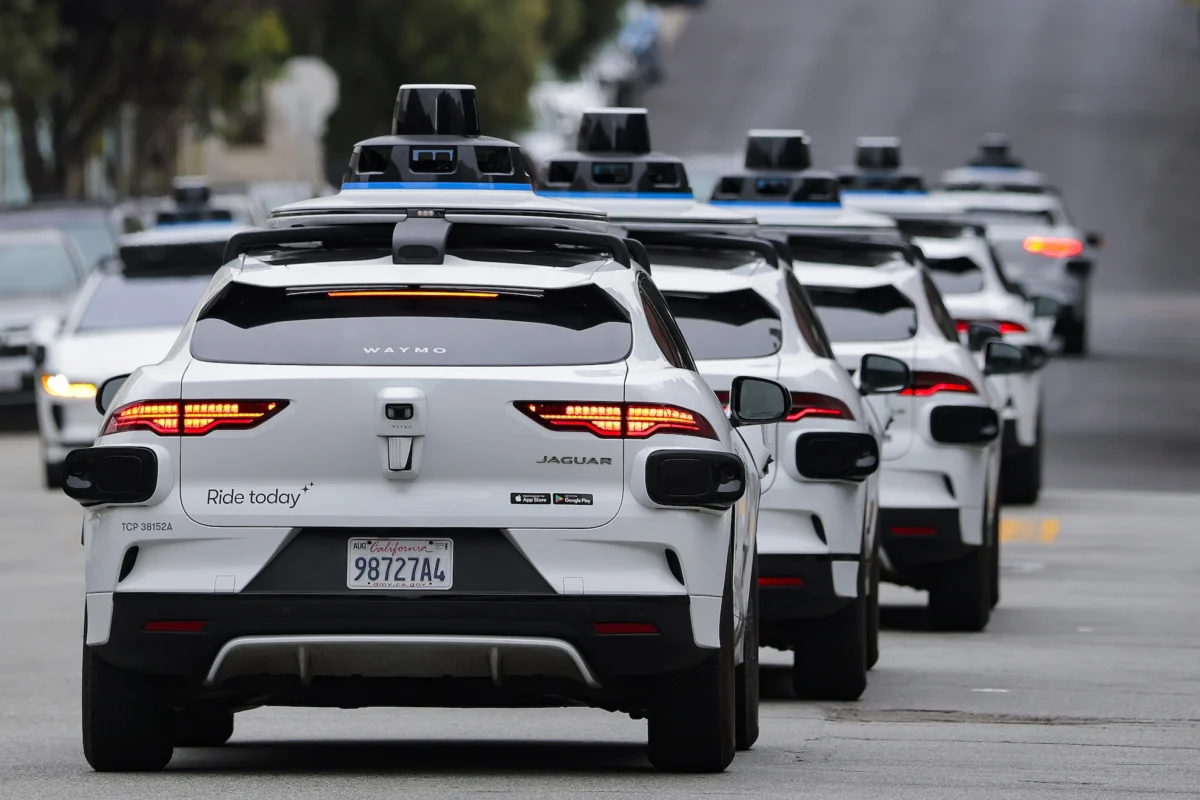 Waymo Robotaxi Service Briefly Halts in San Francisco Amidst Widespread Power Outage, Reigniting Regulatory Debates